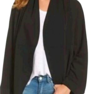 Black caving jacket/cardigan. In excellent condition.